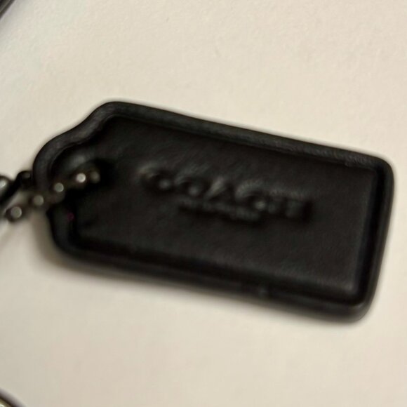 Black leather Coach wristlet with embossed Tyrannosaurus Rex - Picture 3 of 5